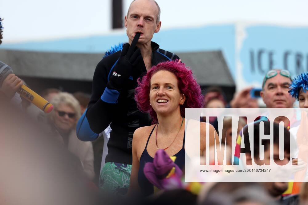 Over 350 New Year revellers, many in fancy dress, take part in the New Year Big Dip at East Wittering Beach in Chichester, West Sussex. More than double the previous record number of people took part, making the most of the warmest New YearÕs Day on record in the UK. JANUARY 1st 2022 MTXx2201