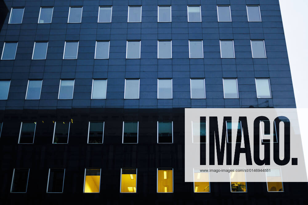 Symbolic photo of empty office space Dark office spaces are seen in a street in Berlin Mitte in the early morning Berlin, 05 01 2022 Berlin Germany