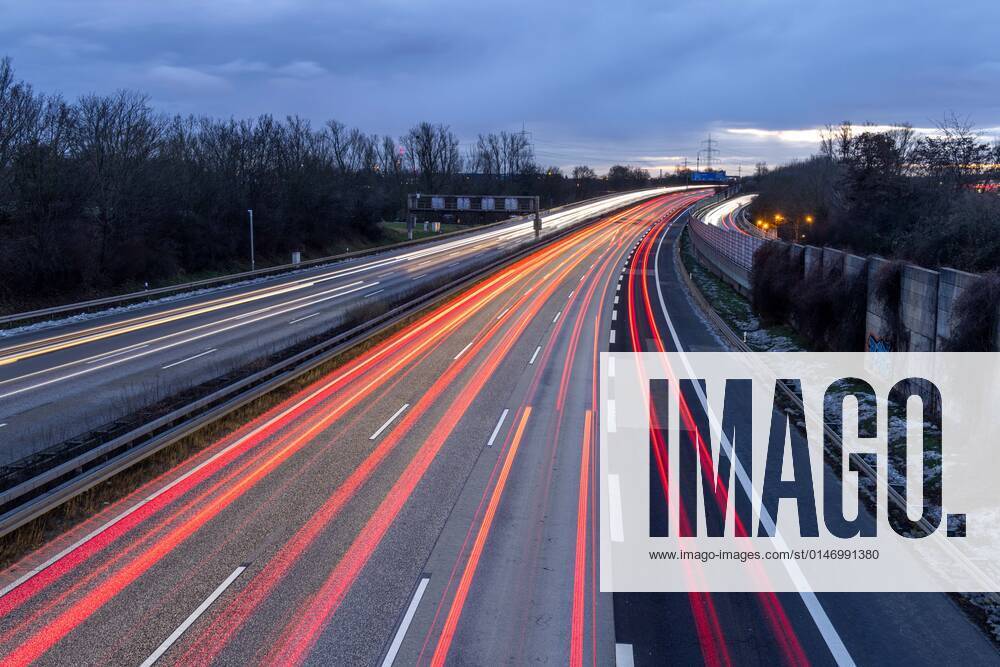 Freeway in the twilight Cars driving on the freeway A5 just before the Bad Homburg interchange in the twilight Shot with long exposure , Bad Homburg Hesse Germany