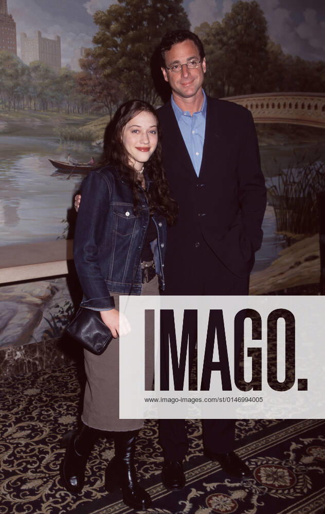 Kat Dennings and Bob Saget attend the WB Upfront 2001 at the Sheraton New York Hotel & Towers in New York City on May 15, 2001. Photo
