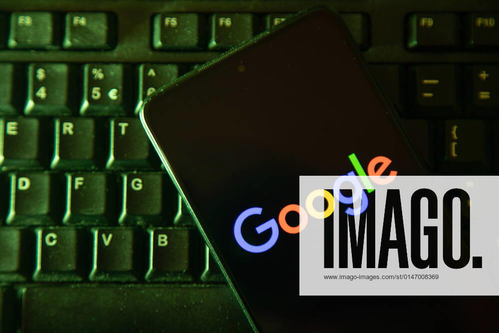 Illustration Of Google Logo Google logo on smartphone display and a keyboard in the background. Google closeup logo displayed on a phone screen, smartphone the logo or the search engine in various backgrounds like keyboard, dark illuminated texture or a computer screen, as seen in this multiple exposure illustration, the company s symbol is globally recognized. Google, LLC is an American tech giant, a multinational technology company that specializes in Internet-related services and products, which include online advertising technologies, a search engine, cloud computing, software, and hardware. It is considered one of the Big Four - Big Tech technology companies in the U.S. and globally. Amsterdam, the Netherlands on January 10, 2022 Ams