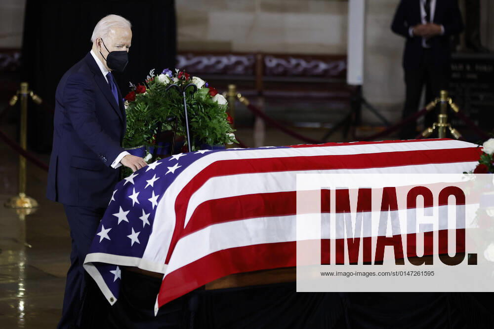 President Joe Biden pays his respects as former Democratic Senate Majority Leader Harry Reid lies in state in the U.S. Capitol Rotunda in Washington, DC on Wednesday, January 12, 2022. Reid, who represented Nevada in Congress for more than 30 years, died December 28, 2021, at the age of 82. Pool photo by Chip Somodevilla WAS20220112903 ChipxSomodevilla