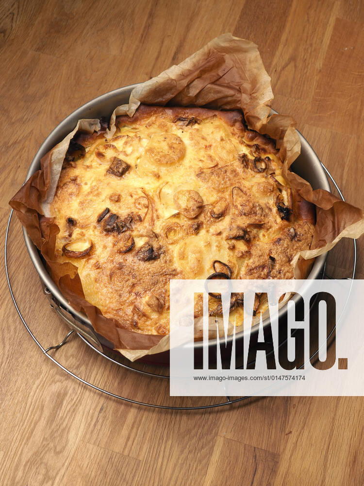 Quiche with potatoes and leeks in a springform pan, vegetarian food, healthy eating