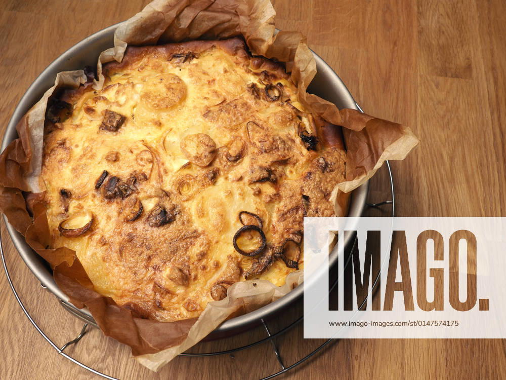 Quiche with potatoes and leeks in a springform pan, vegetarian food, healthy eating
