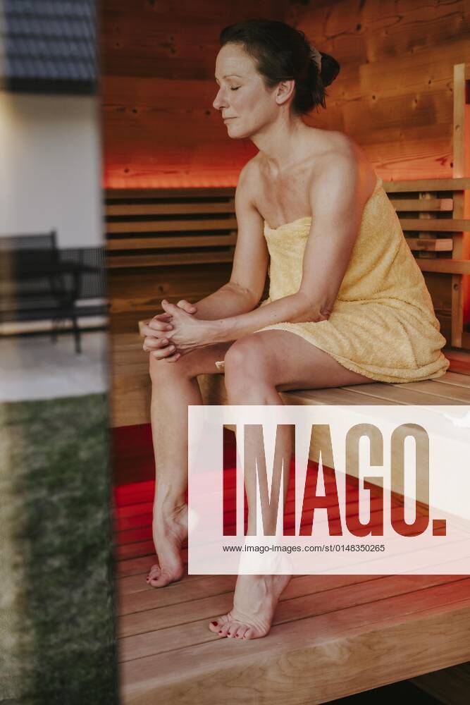 Man with infusion tub in sauna