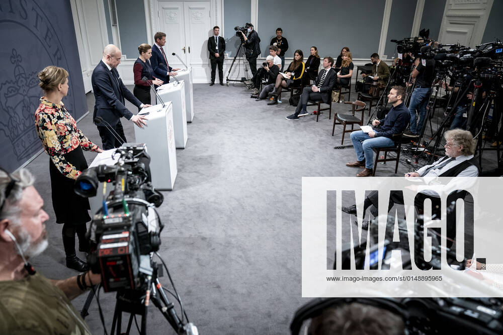 Prime Minister Mette Frederiksen S, Minister of Health Magnus Heunicke S, academic director of the Statens Serum Institut Tyra Grove Krause and director of the National Board of Health Soeren Brostroem during a press conference on the corona situation in the Mirror Room in the Prime Ministers Office, Wednesday 26 January 2022, Copenhagen Denmark