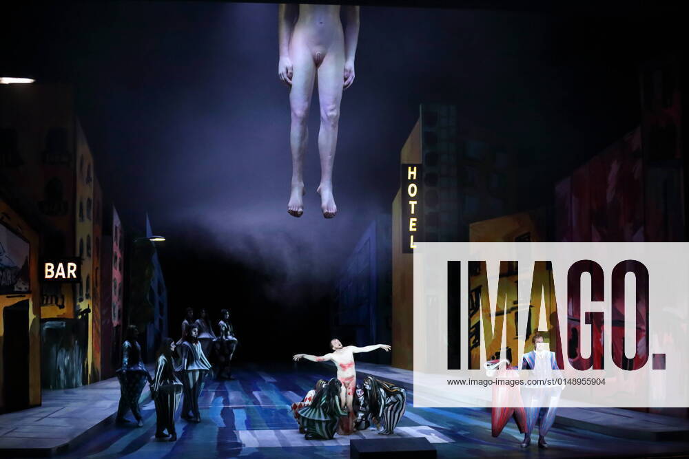 Jonas Grundner Culemann center, as Gods Voice , Thomas Lehman right, as Lucifer and dancers during the photo rehearsal for Antikrist at Deutsche Oper Berlin, January 26, 2022 Opera in two acts by Rued Langgaard Musical direction Stephan Zilias Staging and stage Ersan Mondtag Costumes Annika Lu Hermann and Ersan