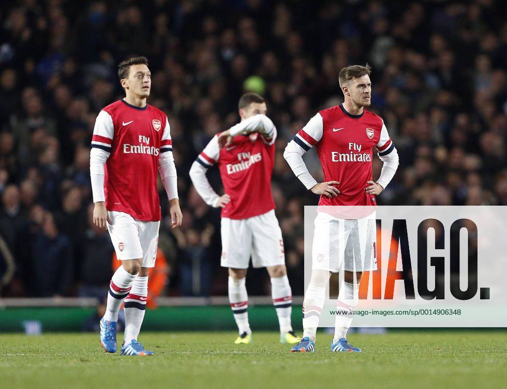 Arsenal s Mesut Ozil and Aaron Ramsey look on dejected after going 2-0 down Arsenal v Chelsea - Capital One Cup Fourth Round - The Emirates - London - England -29 10 2013 - Pic David Klein Sportimage .