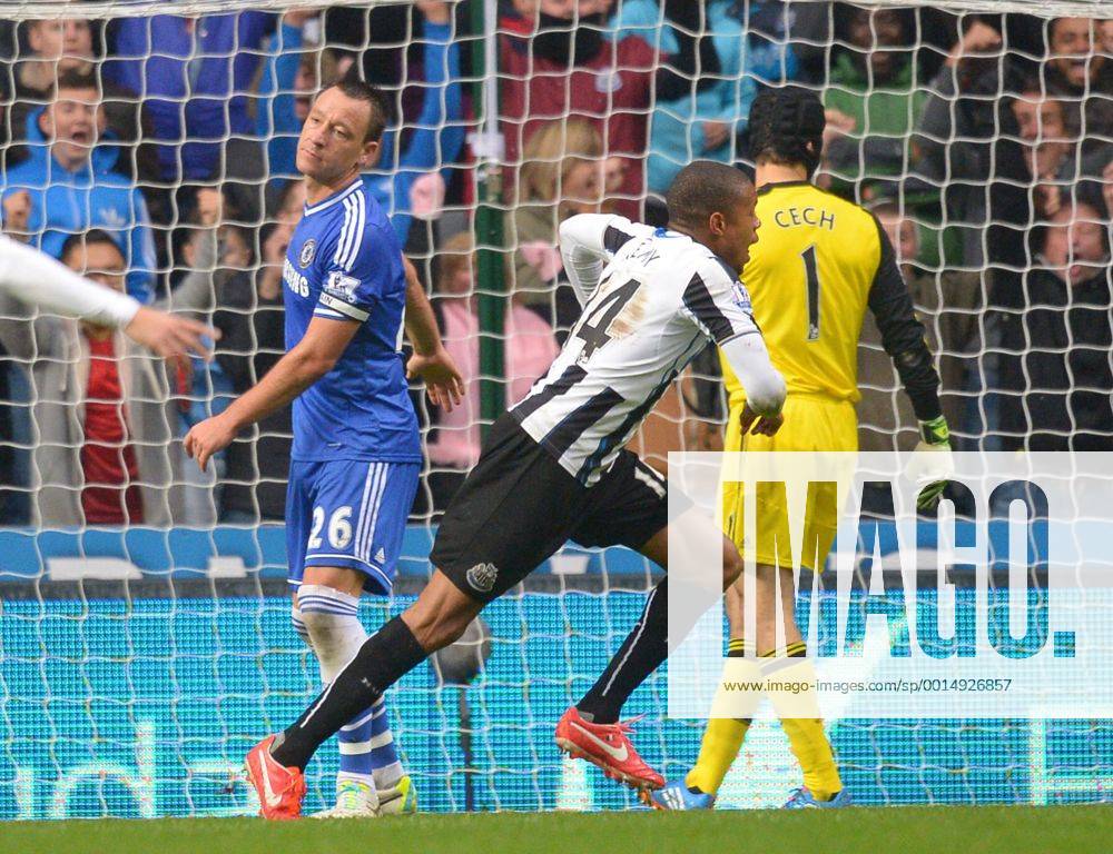 Loic Remy of Newcastle United celebrates the second goal as John Terry of Chelsea looks dejected - Barclays Premier League - Newcastle Utd vs Chelsea - St James Park Stadium - Newcastle - England - 02 11 13 - Picture Simon Bellis Sportimage .