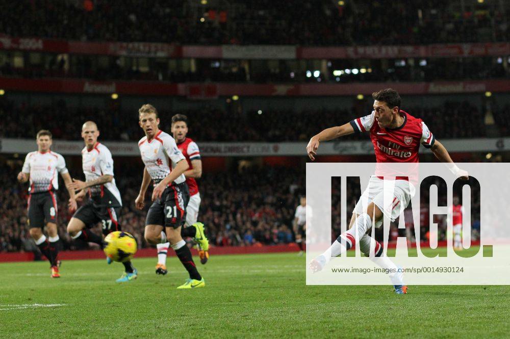 Arsenal s Mesut Ozil fires in a shot Arsenal v Liverpool - Barclays Premier League - Emirates Stadium - London - England -02 11 2013 - Pic David Klein Sportimage .