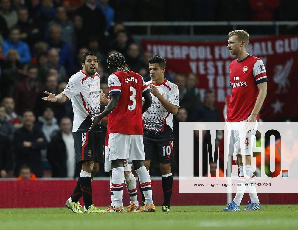 Liverpool s Luis Suarez has words with Arsenal s Bacary Sagna Arsenal v Liverpool - Barclays Premier League - Emirates Stadium - London - England -02 11 2013 - Pic David Klein Sportimage .