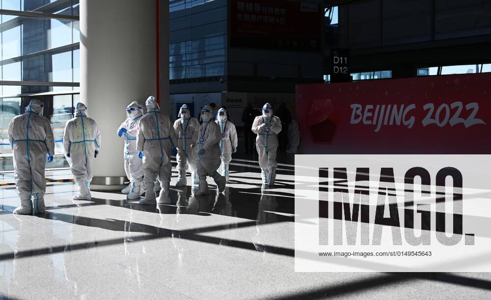 China Coronavirus Daily Life 6751655 01.02.2022 Employees wearing protective gears are seen at the Beijing Daxing International Airport ahead of the 2022 Beijing Winter Olympics, in China. Alexey Filippov Sputnik Beijing China