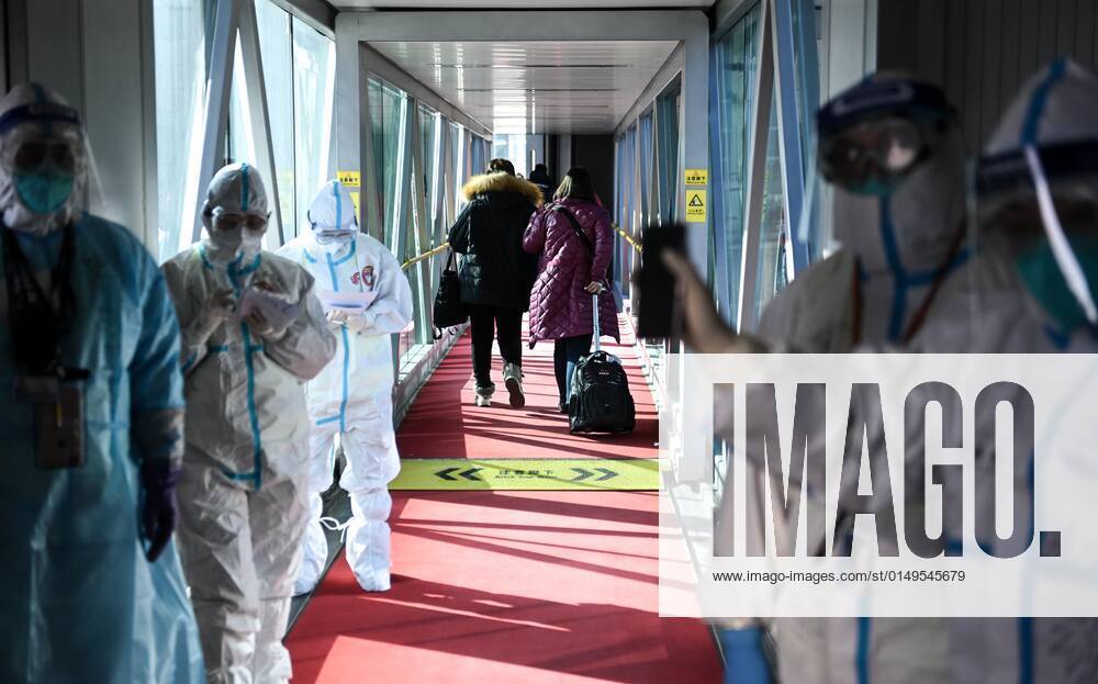 China Coronavirus Daily Life 6751658 01.02.2022 Employees wearing protective gears are seen at the Beijing Daxing International Airport ahead of the 2022 Beijing Winter Olympics, in China. Alexey Filippov Sputnik Beijing China