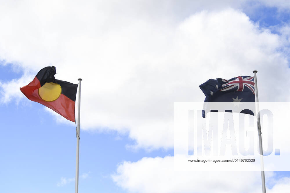 AUSTRALIAN ABORIGINAL FLAG STOCK, An Australian Aboriginal flag and an Australian flag are seen in Canberra, Tuesday, February 4, 2022. ( NO ARCHIVING, , NO USE IN BOOKS WITHOUT CONSENT CANBERRA ACT AUSTRALIA