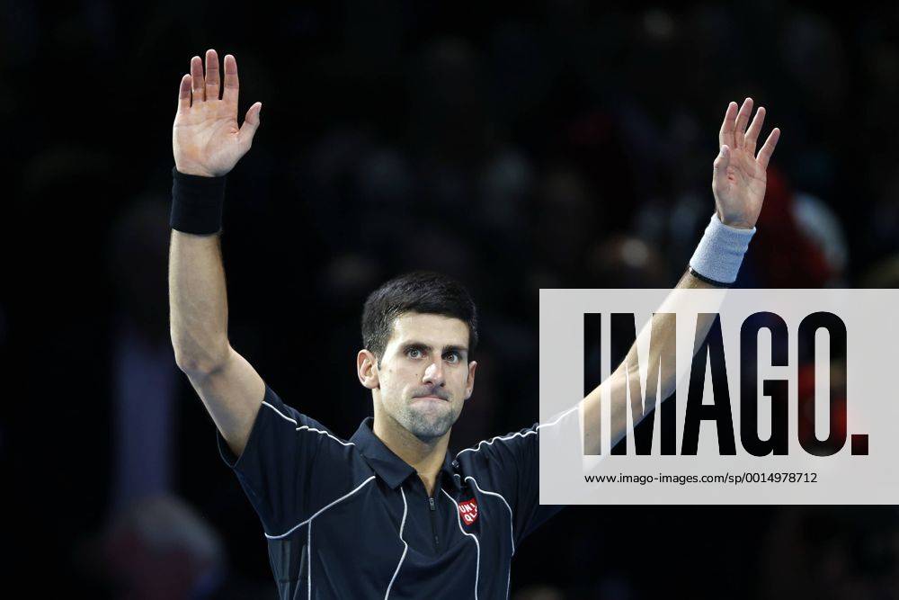 Novak Djokovic of Serbia greets spectators after winning the Singles Group B match on day 4 of the Barclays ATP Tennis Herren World Tour Finals at the O2 Arena in London, Britain, Nov. 7, 2013. Novak Djokovic won 2-1. (Xinhua Wang Lili) (SP)BRITAIN-LONDON-TENNIS-ATP FINALS-SINGLES-GROUP B-