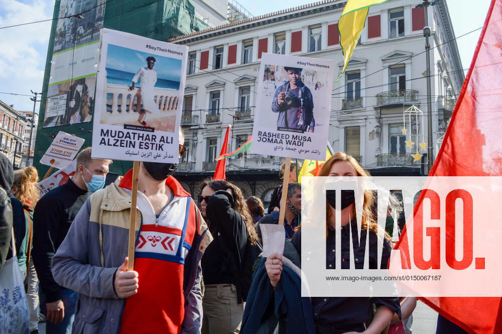 Greece: Protest against migrant pushbacks and border violence in Athens Protesters hold signs with the pictures and the names of missing migrants, during a protest against migrant pushbacks and border violence. Athens Greece