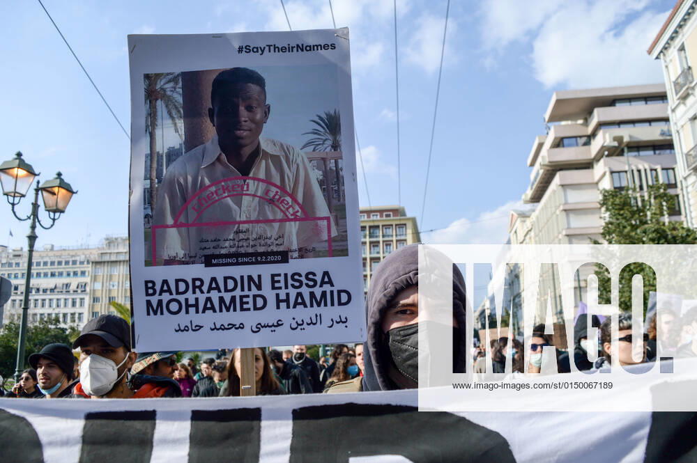 Greece: Protest against migrant pushbacks and border violence in Athens A protester holds a sign with the picture and the name of missing migrant, during a protest against migrant pushbacks and border violence. Athens Greece