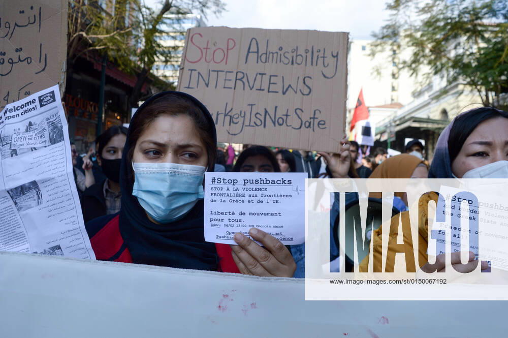 Greece: Protest against migrant pushbacks and border violence in Athens Women migrants from Afghanistan hold signs that read Stop pushbacks during a rally against Greece’s alleged pushbacks of migrants and refugees at the border with Turkey. Athens Greece