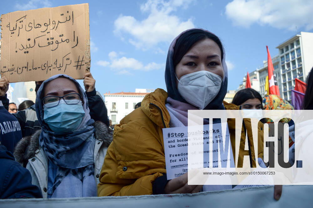 Greece: Protest against migrant pushbacks and border violence in Athens Women migrants from Afghanistan hold signs that read Stop pushbacks during a rally against Greece’s alleged pushbacks of migrants and refugees at the border with Turkey. Athens Greece