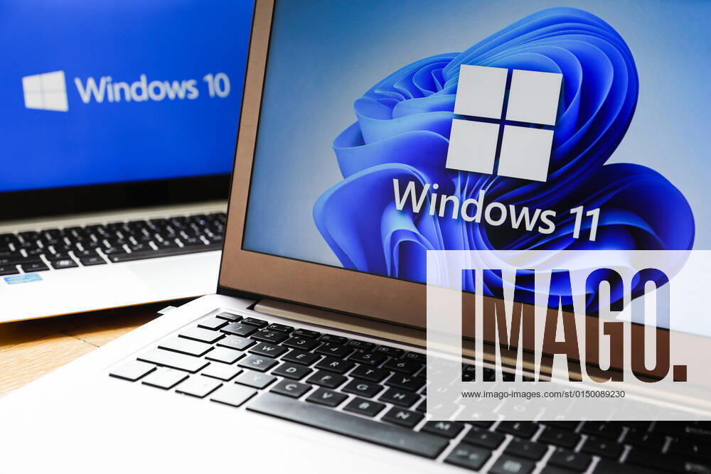Windows 11 Vs. Windows 10 Windows 11 and Windows 10 operating system logos are displayed on laptop screens for illustration photo. Krakow, Poland on February 3, 2022. Krakow Poland