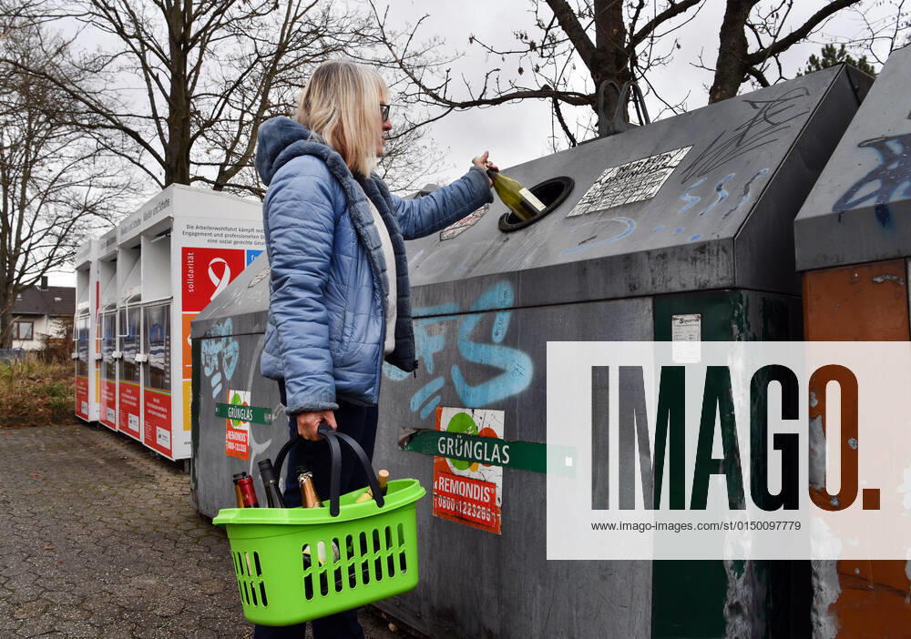 Germany, Bonn, 07 02 2022 waste glass container photo woman at waste glass container waste glass container