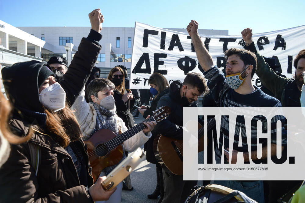 Greece: MeToo Movement Activists Protest outside Athens Court MeToo movement activists and musicians surrounded by Police protest against rape culture outside Athens court, during the jury trial of Dimitris Lignadis the Former Greek National Theatre director who is charged with rape. Protesters shout slogans against the former National Theater director. Athens Greece