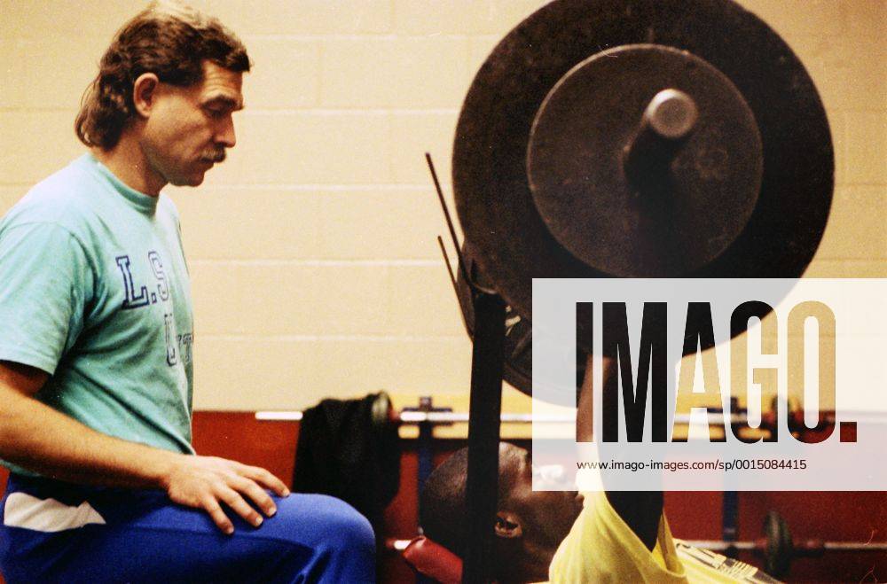 Athletics - Ben Johnson training session - Toronto Metropolitan Hotel Canada s Ben Johnson, serving a suspension for his failed drugs test at the Seoul Olympics, trains in the weights room with coach Loren Seagrave for his comeback race that took place the next month. 10 12 1990