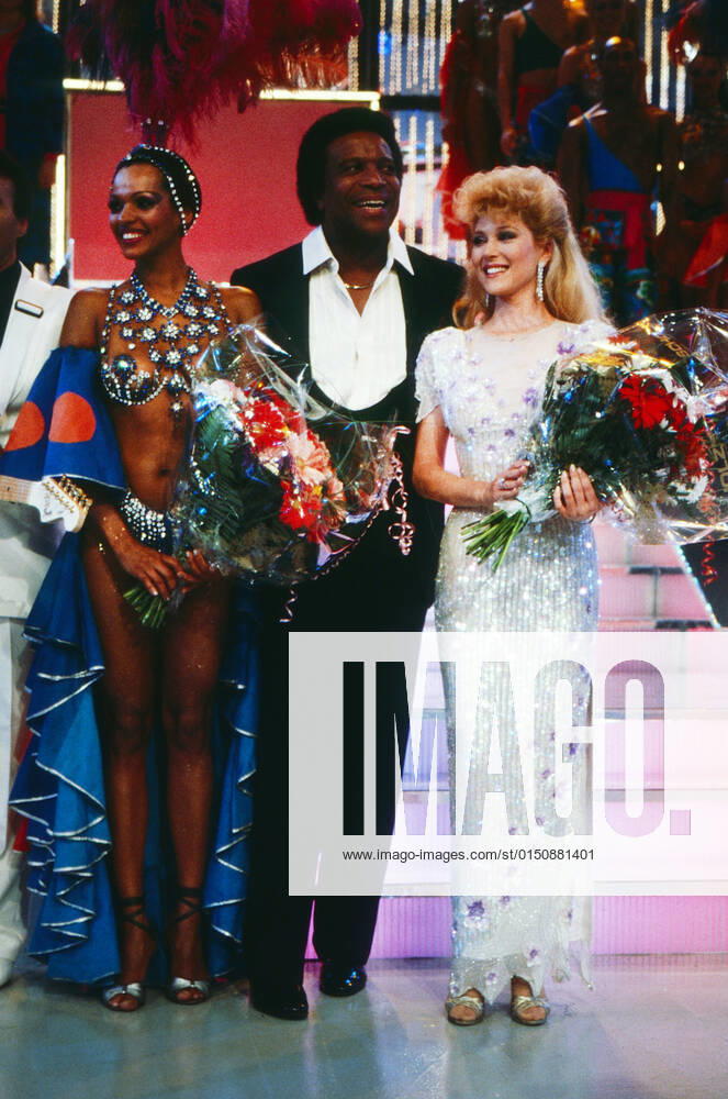 AUDREY LANDERS, ROBERTO BLANCO Audrey Landers, amerikanische Sängerin und Schauspielerin und Sänger Roberto Blanco in einer TV-Show circa 1989. Audrey Landers, American actress and singer with singer Roberto Blanco in a TV show circa 1989., Deutschland