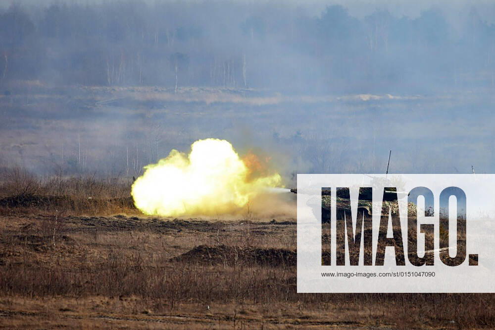Ukrainian President Volodymyr Zelensky (not shown) watches Ukrainian troops take part in a military drill outside the city of Rivne, northern Ukraine on Wednesday on February 16, 2022. KYV2022021610 UkrainianxDefencexministryxpress