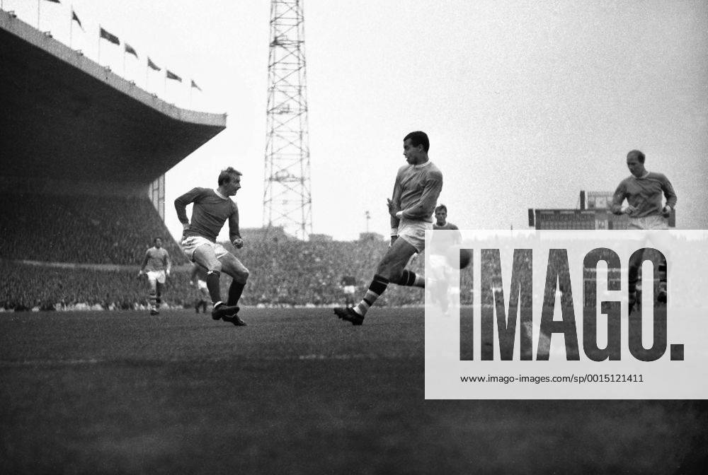 Football - 1966 1967 First Division - Manchester United 1 Manchester City 0 United s Denis Law, left, and City s Stan Horne, centre, at Old Trafford. 17 09 1966
