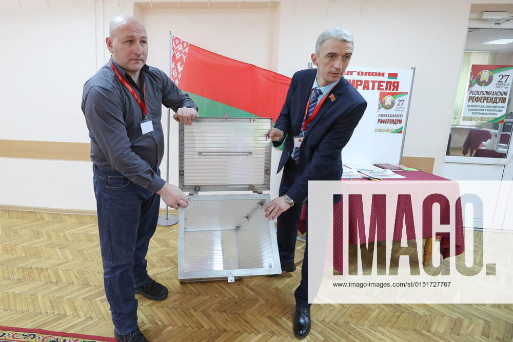 Local electoral commission chairman Boris Sobolev and his deputy Nikolai Prakapovich demonstrate a transparent ballot box before sealing it at polling station No 5 ahead of the start of early voting in the 2022 Belarusian constitutional referendum, which is scheduled for February 27. Alexander Khitrov BelTA TASS TS124EA2