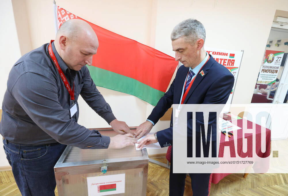 Local electoral commission chairman Boris Sobolev and his deputy Nikolai Prakapovich seal a ballot box at polling station No 5 ahead of the start of early voting in the 2022 Belarusian constitutional referendum, which is scheduled for February 27. Alexander Khitrov BelTA TASS TS124EA4