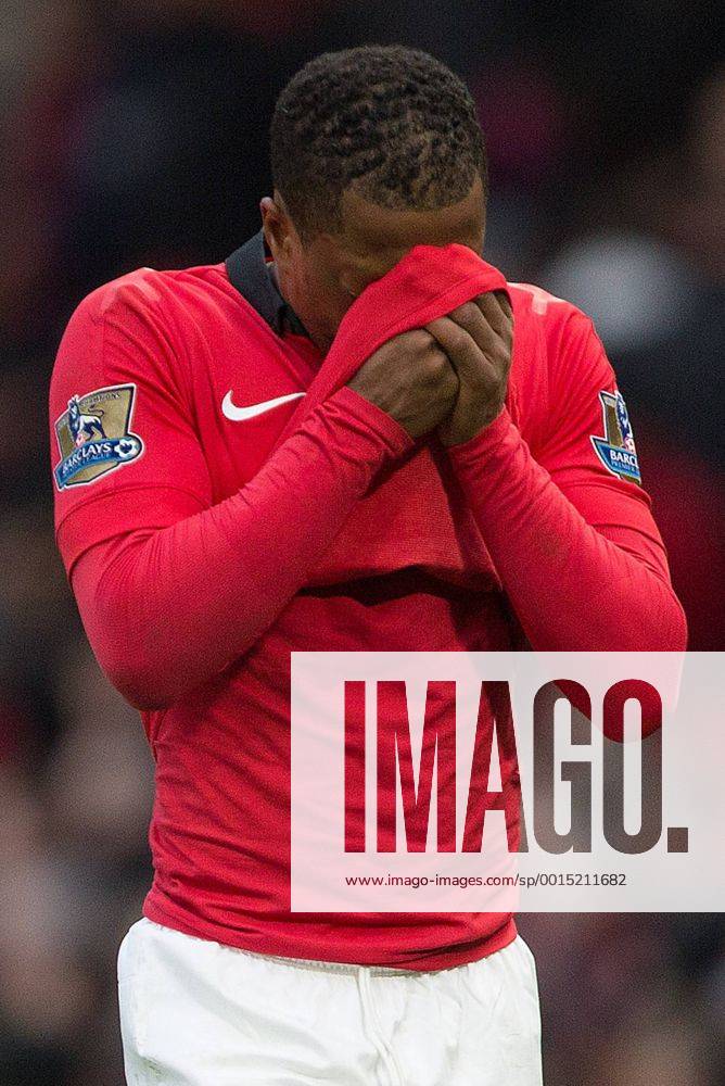 Patrice Evra of Manchester United looks dejected as he leaves the pitch following defeat - Manchester United vs. Newcastle United - Barclays Premier League - Old Trafford - Manchester - 04 12 2013 Pic Philip Oldham Sportimage .