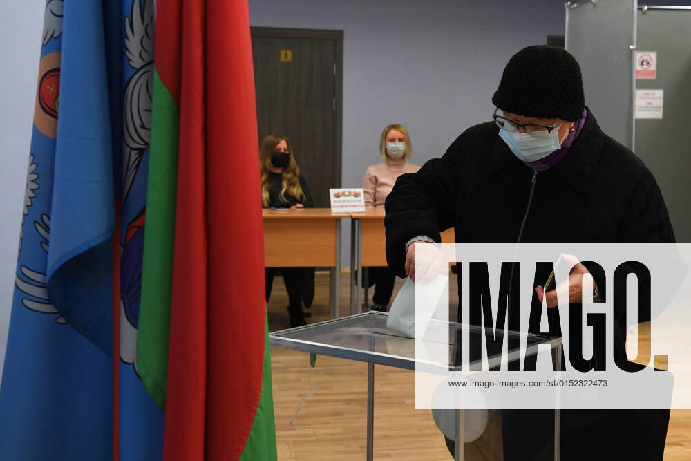 Belarus Constitutional Referendum 8127645 27.02.2022 A woman casts his ballot during a voting in a referendum on amendments to the Belorussian constitution at a polling station in Minsk, Belarus. Alexandr Kryazhev Sputnik Minsk Belarus