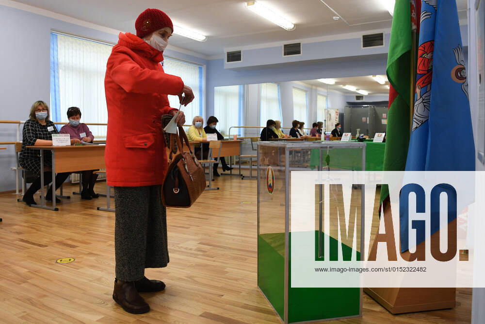 Belarus Constitutional Referendum 8127646 27.02.2022 A woman casts his ballot during a voting in a referendum on amendments to the Belorussian constitution at a polling station in Minsk, Belarus. Alexandr Kryazhev Sputnik Minsk Belarus
