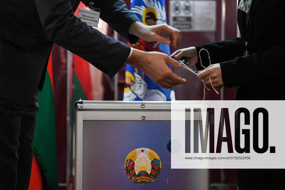 Belarus Constitutional Referendum 8127651 27.02.2022 Members of an electoral commission seal a voting box in a referendum on amendments to the Belorussian constitution at a polling station in Minsk, Belarus. Alexandr Kryazhev Sputnik Minsk Belarus