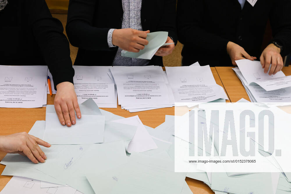 MINSK, BELARUS â€“ FEBRUARY 27, 2022: Election commission staff count votes after the 2022 Belarusian constitutional referendum at polling station No 50. In August 2020, mass protests erupted in major cities across Belarus after the results of the 2020 Belarusian presidential election were announced. Belarusian President Lukashenko announced plans for amendments to the constitution and his readiness to redistribute presidential powers to the other branches of government. Peter Kovalev TASS TS125A16