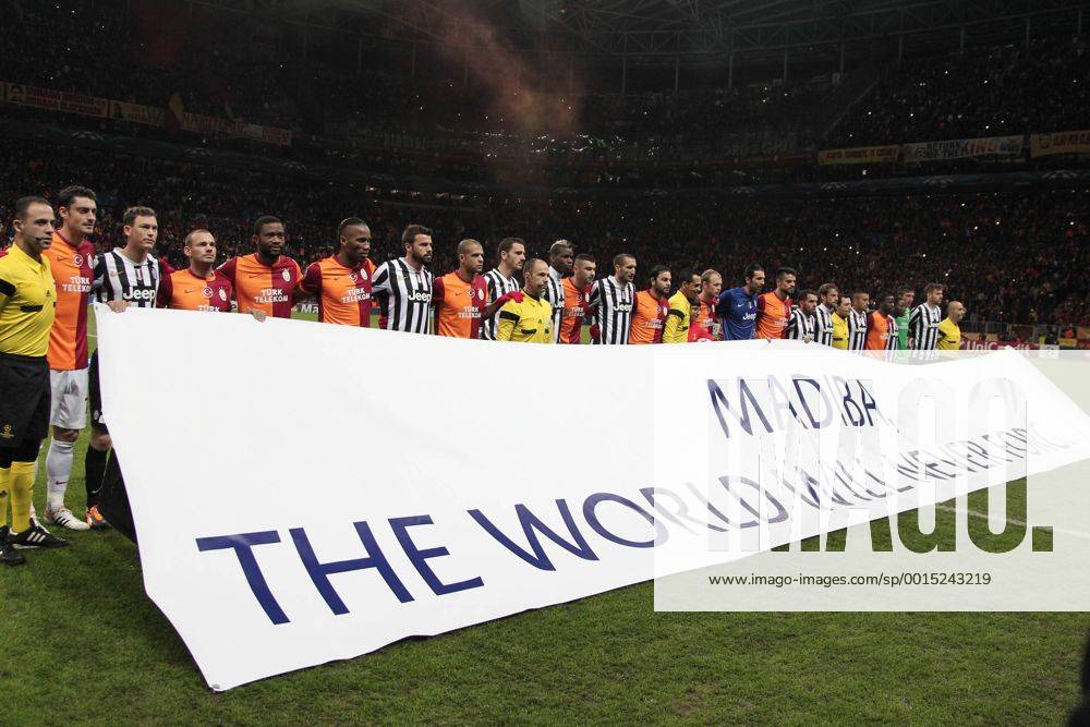 UEFA Champions League group B match between Galatasaray Istanbul and Juventus at Turk Telekom Arena Stadium on December 10, 2013 in Istanbul, Players stand behind a banner for Nelson Mandela.