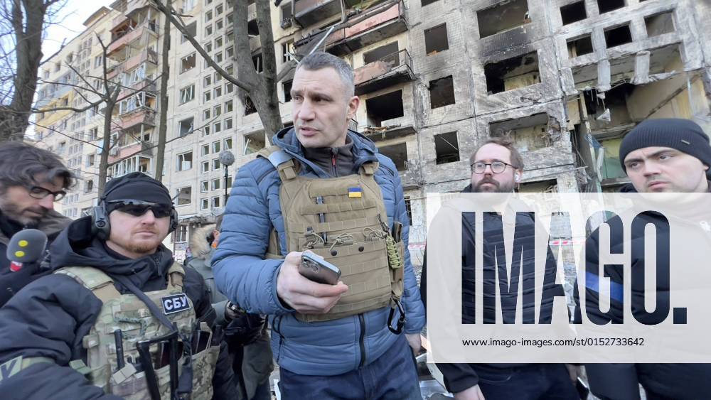 Vitali Klitschko, Kyiv Mayor and former heavyweight champion, centre, visits ruin of residential house hit by Russian fire in Kyiv, Ukraine, during the Russian invasion, as Russia invaded Ukraine on February 24, pictured on March 14, 2022. (CTKxPhoto PavelxNemecek) CTKPhotoF202203141606901