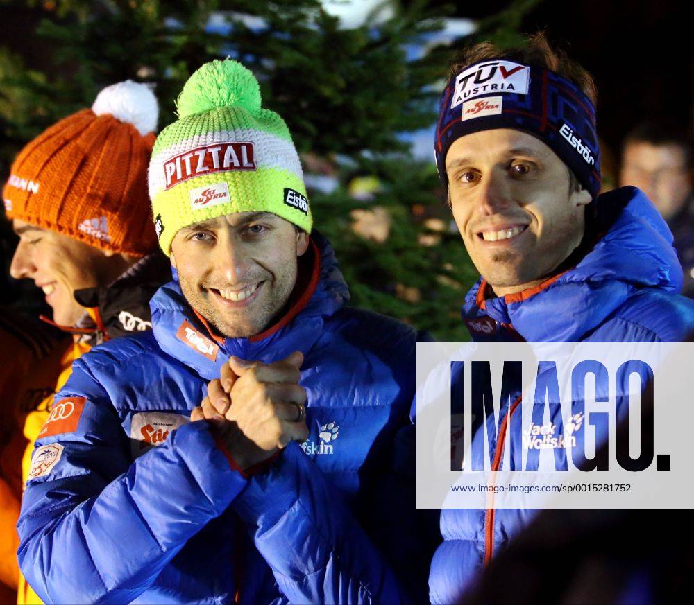 SKI NORDISCH - FIS WC Ramsau, Team RAMSAU,AUSTRIA,14.DEZ.13 - SKI NORDISCH, NORDISCHE KOMBINATION - FIS Weltcup, Teambewerb, Siegerehrung. Bild zeigt Mario Stecher und Lukas Klapfer (AUT).