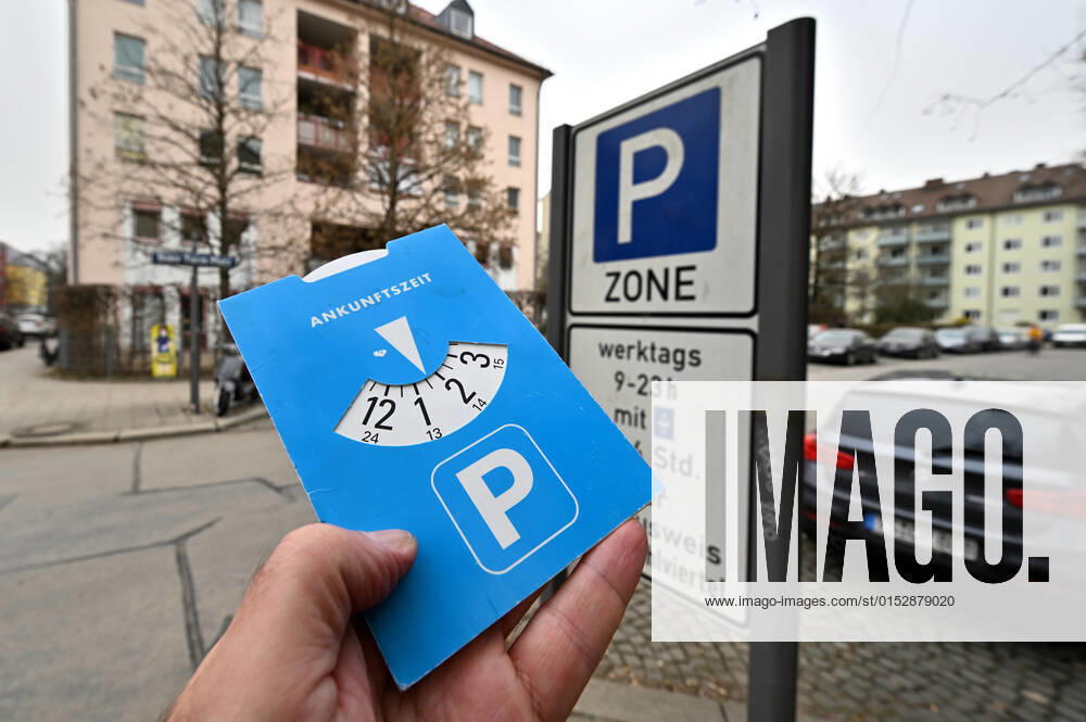Do not forget otherwise it will be expensive parking disc with set arrival time for parking in the Blue Zone in downtown Munich Bavaria Germany