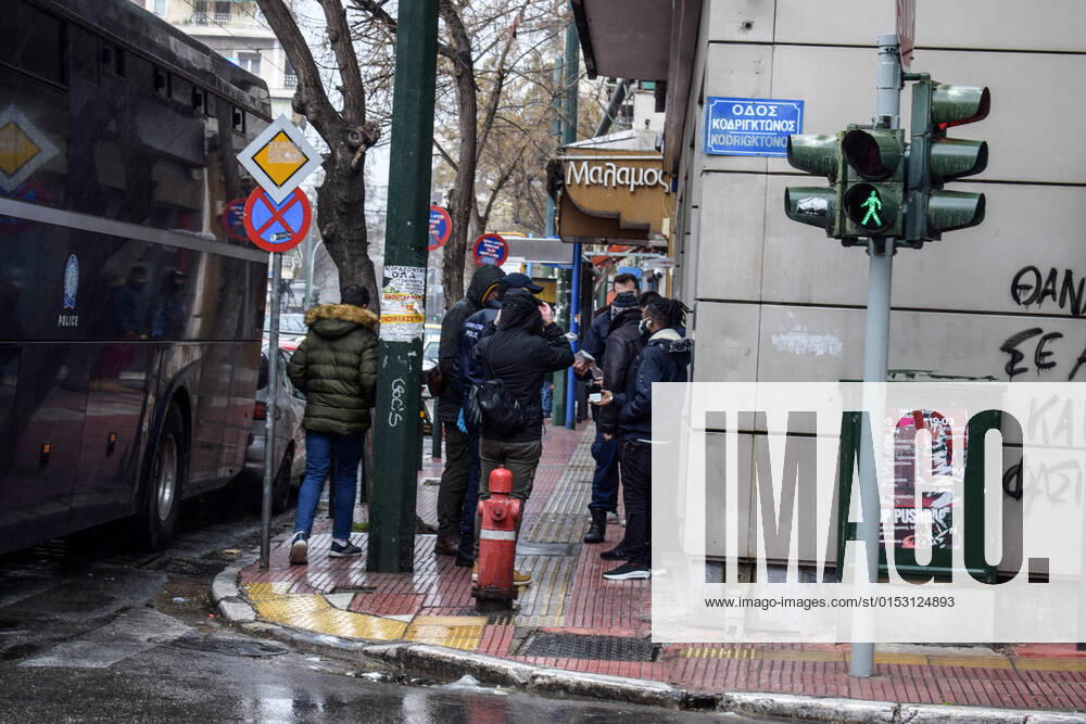 Greek Police detain irregular migrants without legal documents Greek Police officers inspect documents and detain irregular migrants without legal residence permit in the Aghios Panteleimonas area in central Athens, a district with high immigrant population. Athens Greece