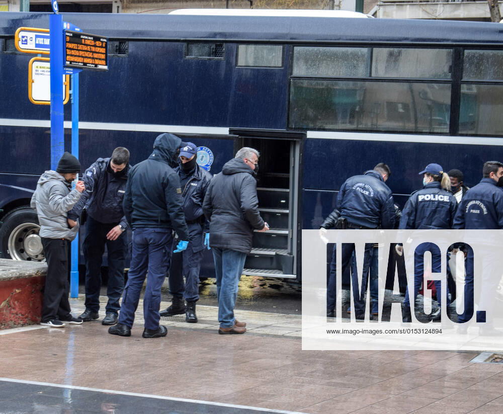 Greek Police detain irregular migrants without legal documents Greek Police officers inspect documents and detain irregular migrants without legal residence permit in the Aghios Panteleimonas area in central Athens, a district with high immigrant population. Athens Greece