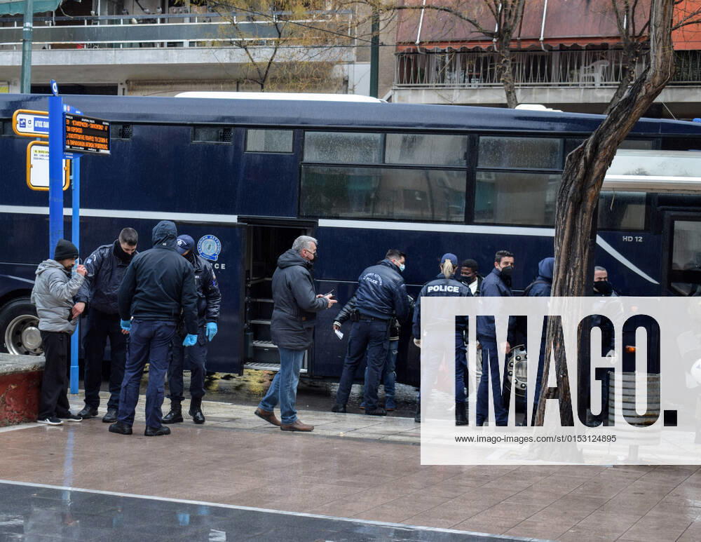 Greek Police detain irregular migrants without legal documents Greek Police officers inspect documents and detain irregular migrants without legal residence permit in the Aghios Panteleimonas area in central Athens, a district with high immigrant population. Athens Greece
