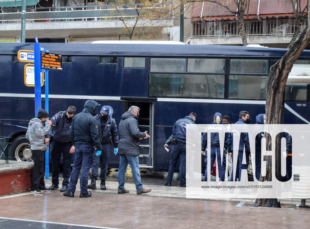 Greek Police detain irregular migrants without legal documents Greek Police officers inspect documents and detain irregular migrants without legal residence permit in the Aghios Panteleimonas area in central Athens, a district with high immigrant population. Athens Greece