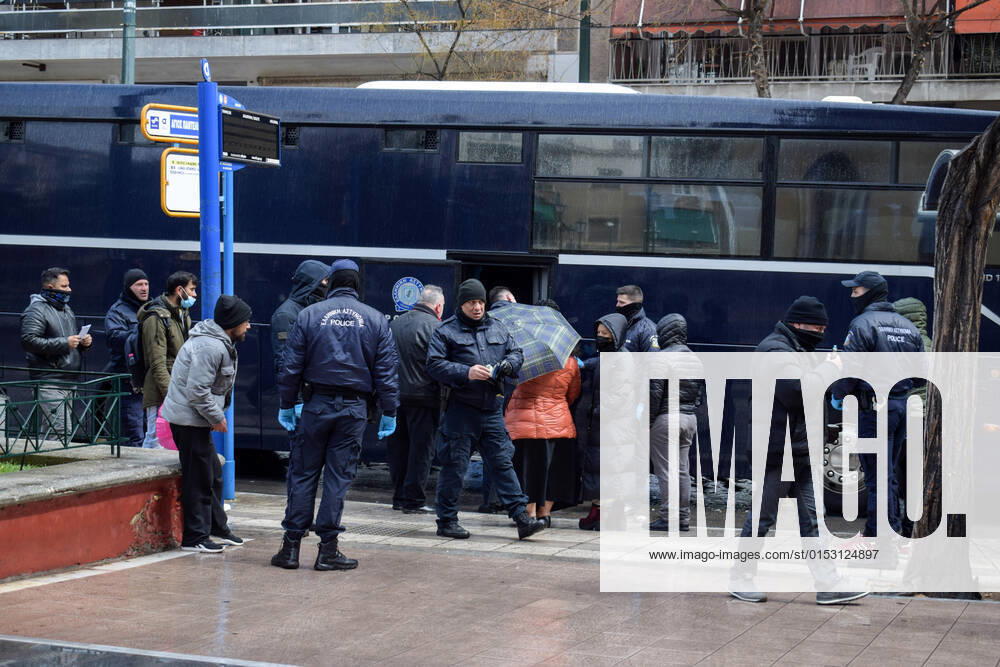 Greek Police detain irregular migrants without legal documents Greek Police officers inspect documents and detain irregular migrants without legal residence permit in the Aghios Panteleimonas area in central Athens, a district with high immigrant population. Athens Greece