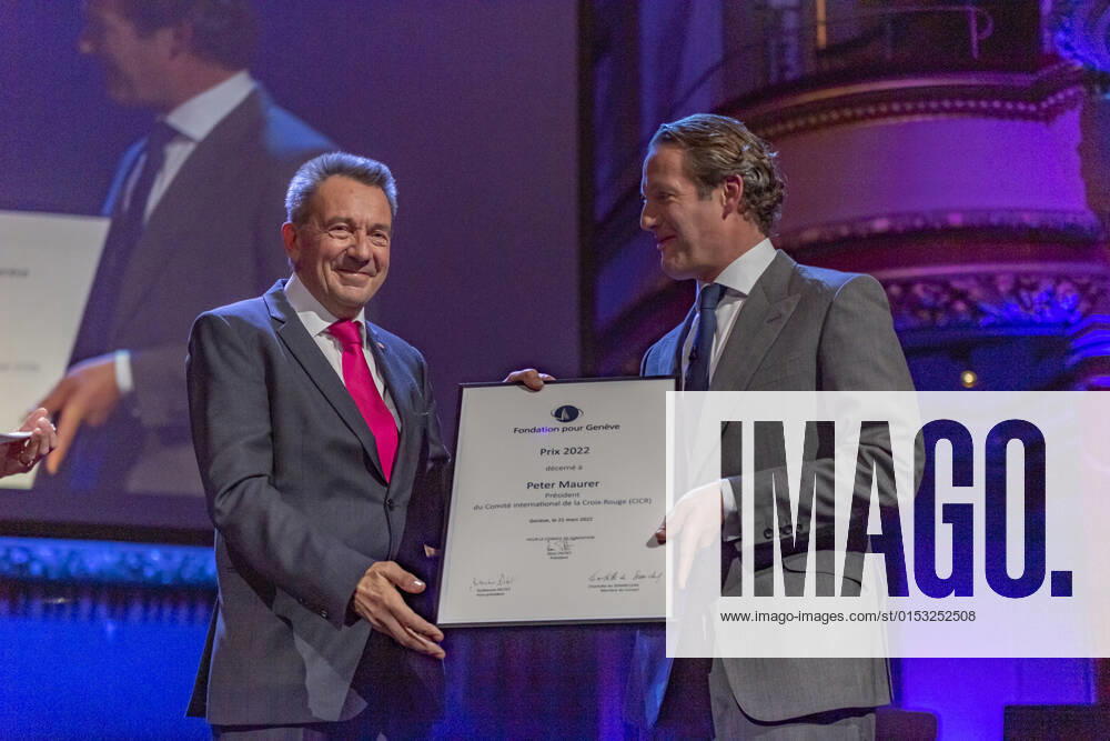 Switzerland: Foundation Award Ceremony for Geneva 2022 Peter Maurer (President of ICRC) (L) receives the Foundation Prize for Geneva for his work with the International Committee of the Red Cross, from the hand of the Marc Pictet (Director of the Pictet group) (R) during the Foundation Award Ceremony for Geneva 2022. Geneva Switzerland Switzerland