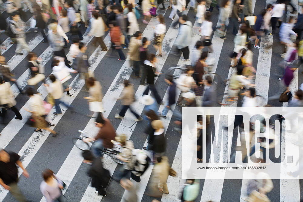 IMAGO Nature: Unsere Erde, Umweltprobleme, Überbevölkerung Japan Osaka People crossing street view from above motion blur, model released, , property released, , 33097774.jpg, Outdoors, Busy, Motion Blur, Elevated View, View From Above, Walking, Large Group Of People, Road, Crowd, Street, City Location, Japanese, Crossing, Commuting, city life, urban scene, city, On The Move, Pedestrian Crossing, Rush Hour, Asia, Japan, Aerial, pedestrian, Osaka, Osaka Station, zebra crossing, commuters, crowds,