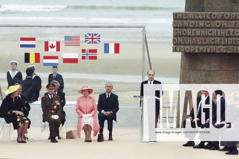 Queen Elizabeth II in France (1994) Omaha Beach, 50th anniversary of the D-Day Landings (Normandy, north-western France), 1994 06 06: international ceremony in the presence of Queen Elisabeth II, wearing a pink outfit with a matching hat, Francois Mitterrand, Edouard Balladur, Bill Clinton, Vaclav Havel, Lech Walesa and Beatrix, Queen of the Netherlands Normandy; Lower Normandy; Calvados 14 Europe; Western Europe; France