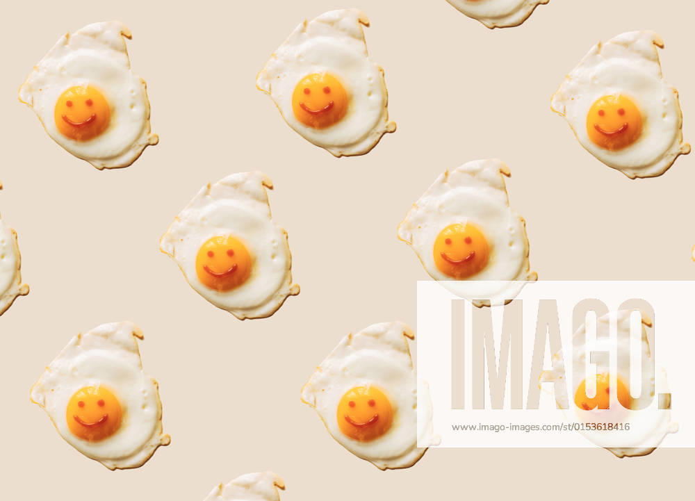 Fried eggs with anthropomorphic smiley faces on yolks, EGHF00373